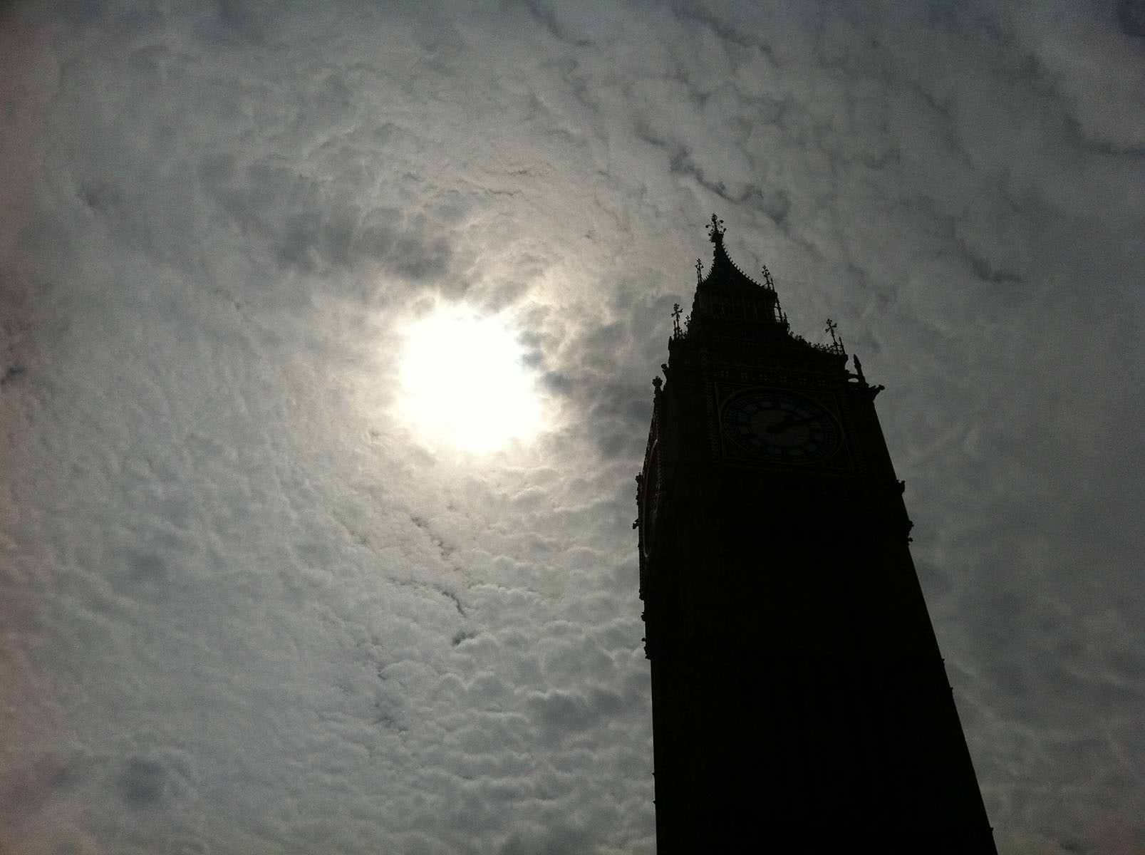 #EUROTRIP13: Bidding Farewell To London The sun disappears behind the clouds at London's iconic Big Ben during Notre Dame's final day in the British capital on Wednesday.