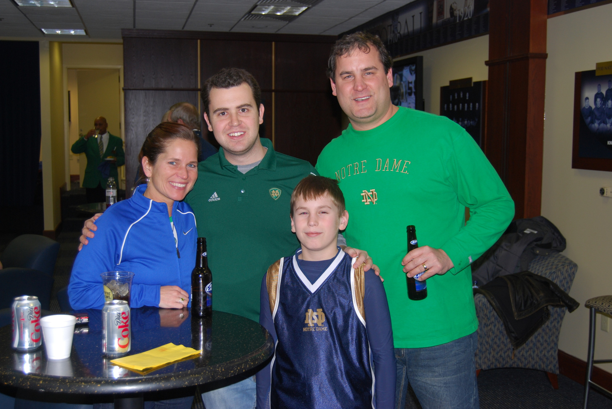 Monogram Club Holds Alumni Sports Weekend Reception, Winter Board Meeting Monogram Club board member Matt Castellan '04 (center left) and friends at the reception.