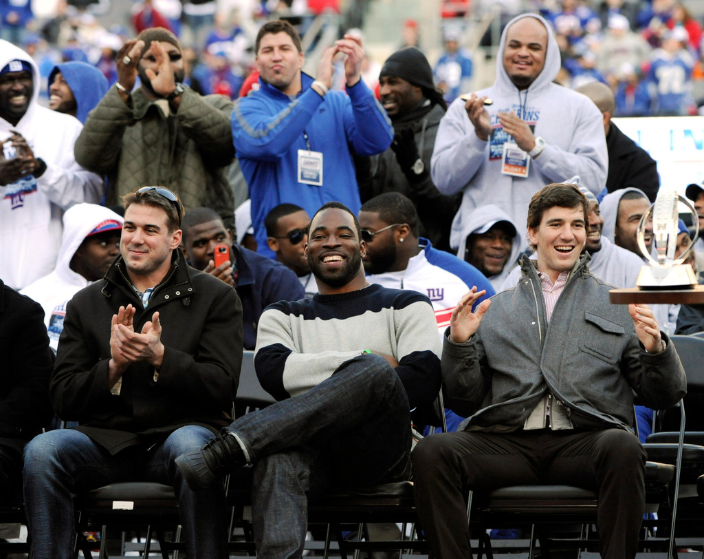 Justin Tuck & Sergio Brown at Super Bowl XLVI (AP)