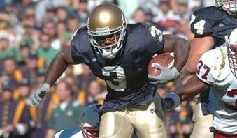 Irish Climb Past Cardinal, 23-15 Darius Walker heads upfield during the second quarter.
