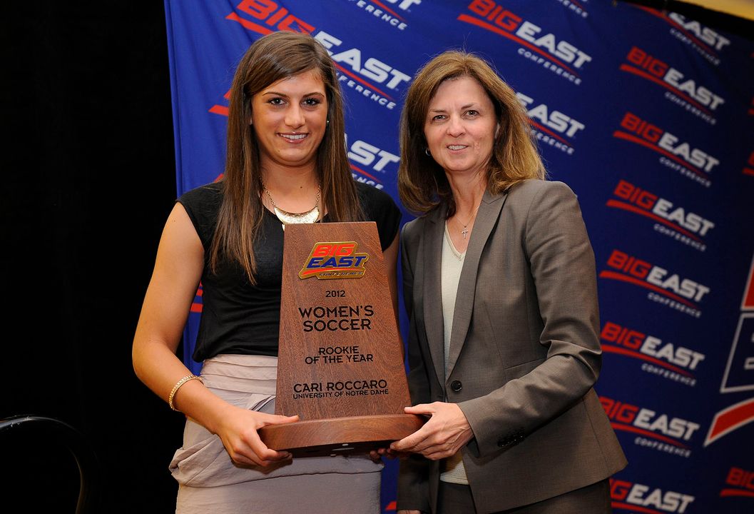 Notre Dame freshman forward/midfielder/defender Cari Roccaro was a triple honoree at Thursday night's BIG EAST Awards Banquet, including her selection as the 2012 BIG EAST Rookie of the Year (pictured here receiving the trophy from BIG EAST Women's Soccer Committee member Lynn Tighe of Villanova).