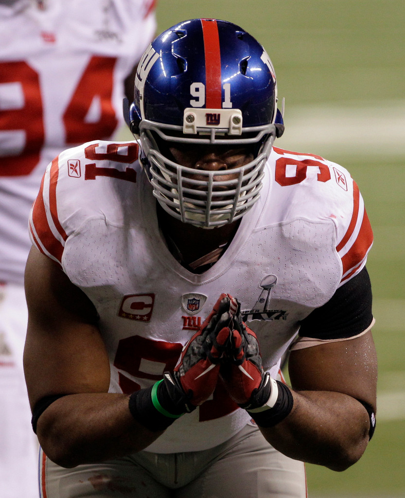 Justin Tuck & Sergio Brown at Super Bowl XLVI (AP)