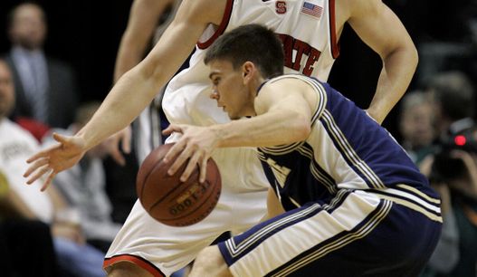 Notre Dame's Chris Quinn, front, is defended by North Carolina State's Andrew Brackman during the first half. (AP Photo/Darron Cummings)