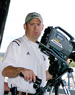 Film At Eleven Tim Collins (at the camera) is in his 14th year as the video systems technician for Notre Dame football. Steve Horvath (left) has worked with the Irish video staff since 1958.