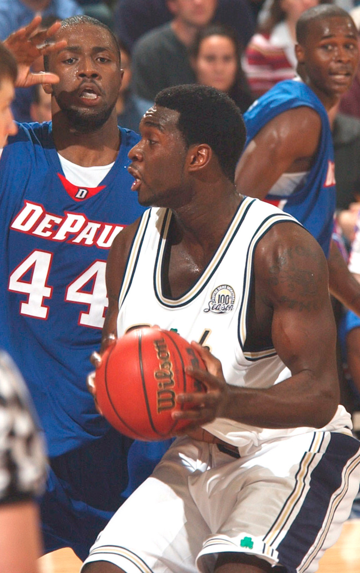 Irish Fall To Blue Demons, 84-73 Torin Francis drives the lane as DePaul's Marlon Brumfield defends.