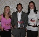 Katie Thorlakson (left) and Melissa Tancredi - pictured with Irish head coach Randy Waldrum at the BIG EAST awards banquet - have been named to the list of final 15 candidates for the 2004 MAC Hermann Trophy.