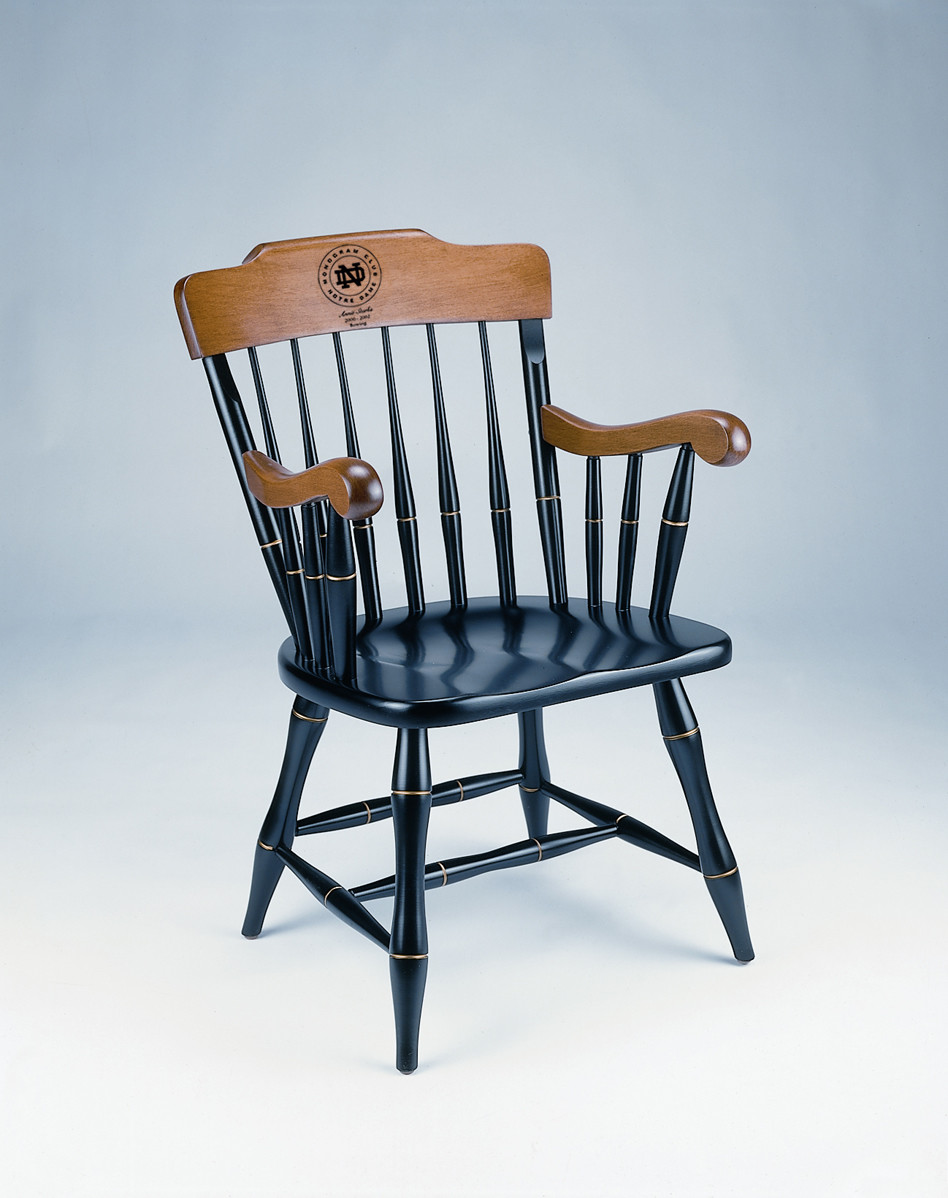 Monogram Club Unveils Custom Chair For Order In 2013 This sleak wood chair, offered exclusively to Monogram winners, comes in rich black with cherry arms and crown and allows for personalization specific to your requests.