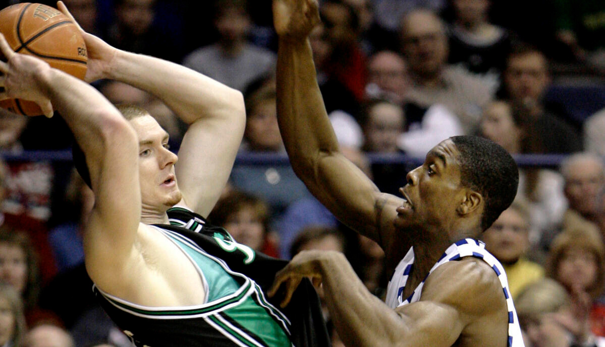 Irish Fall In Last Minute At DePaul Colin Falls looks to a pass against DePaul's Karron Clarke during the first half. (AP Photo/Nam Y. Huh)
