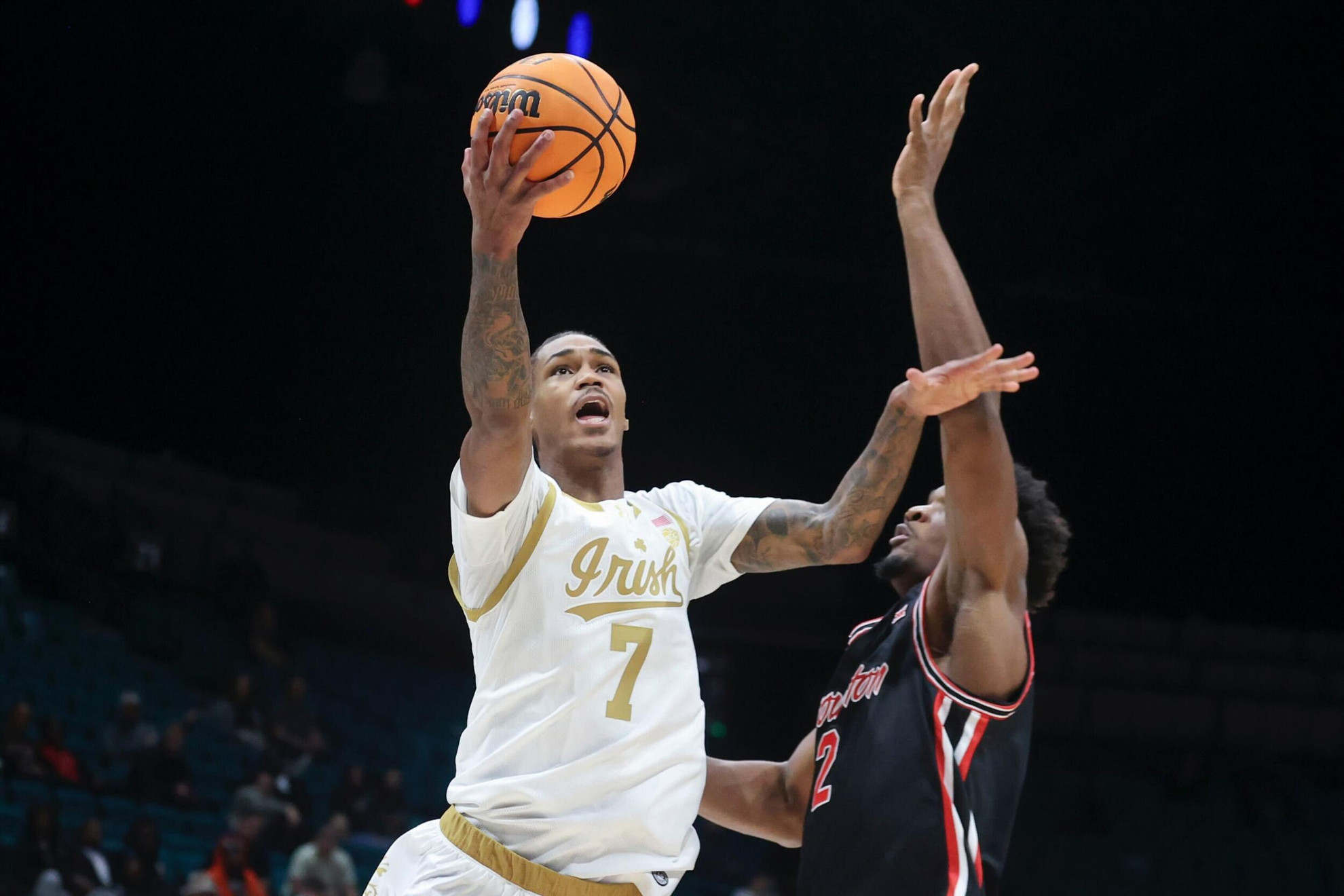 Irish Go Toe-To-Toe With #6/7 Houston But Fall Late, 54-65 Irish Go Toe-To-Toe With #6/7 Houston But Fall Late, 54-65