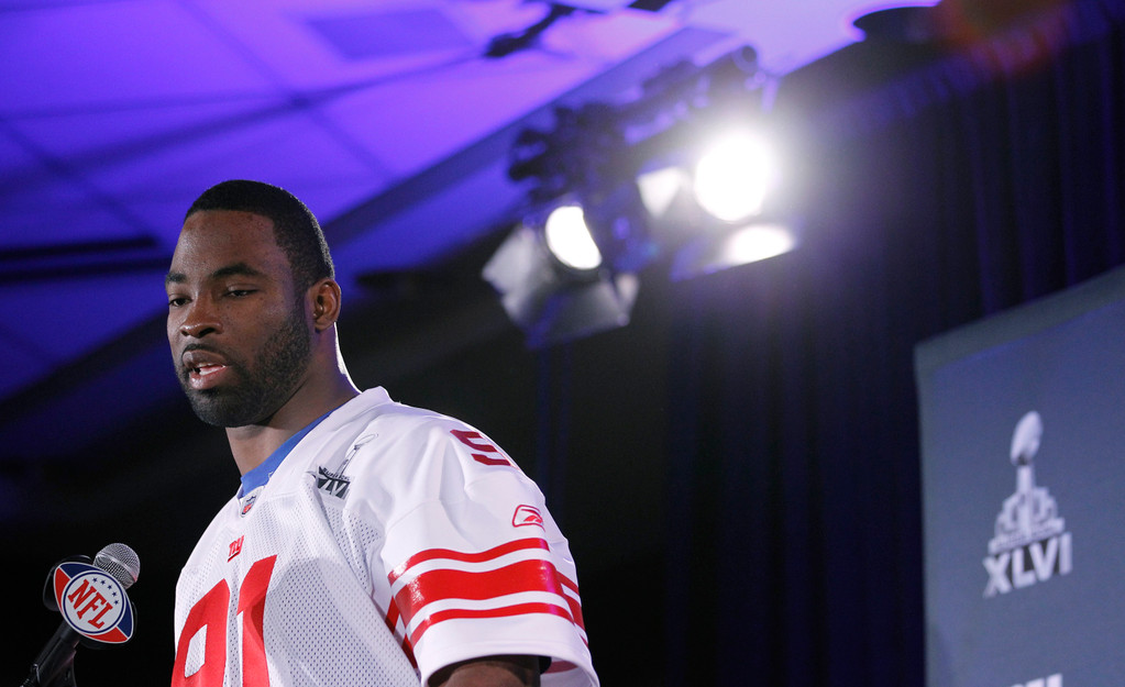 Justin Tuck & Sergio Brown at Super Bowl XLVI (AP)