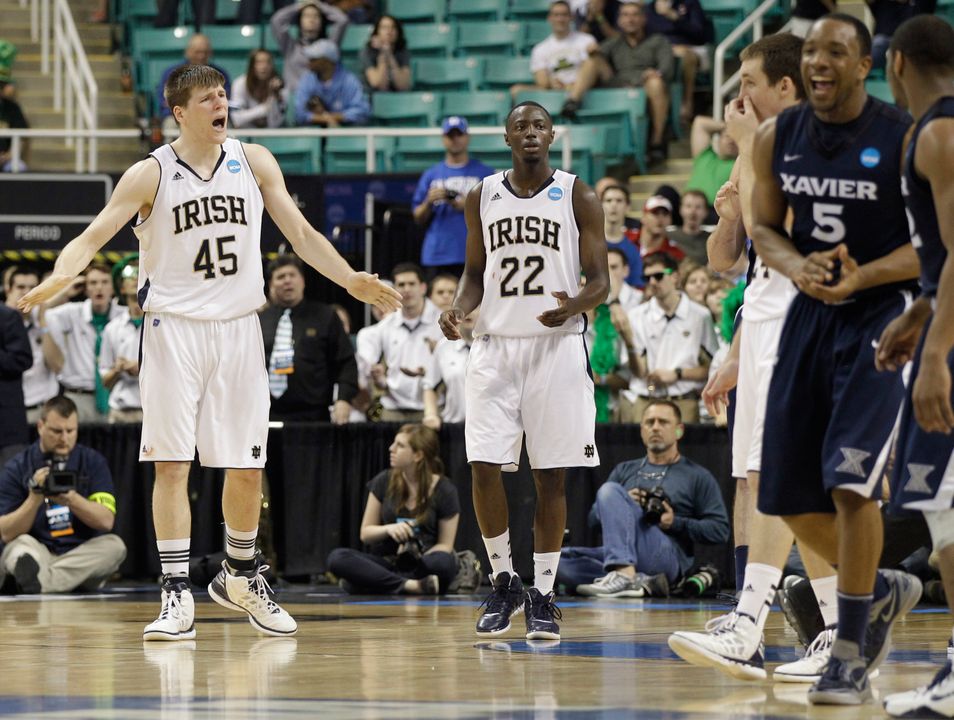 Jack Cooley (45) cheers his teammates on in the closing seconds of the second half of a South Regional NCAA tournament second-round game in Greensboro, N.C., Friday, Mar. 16, 2012. (AP Photo/Zach Gibson)