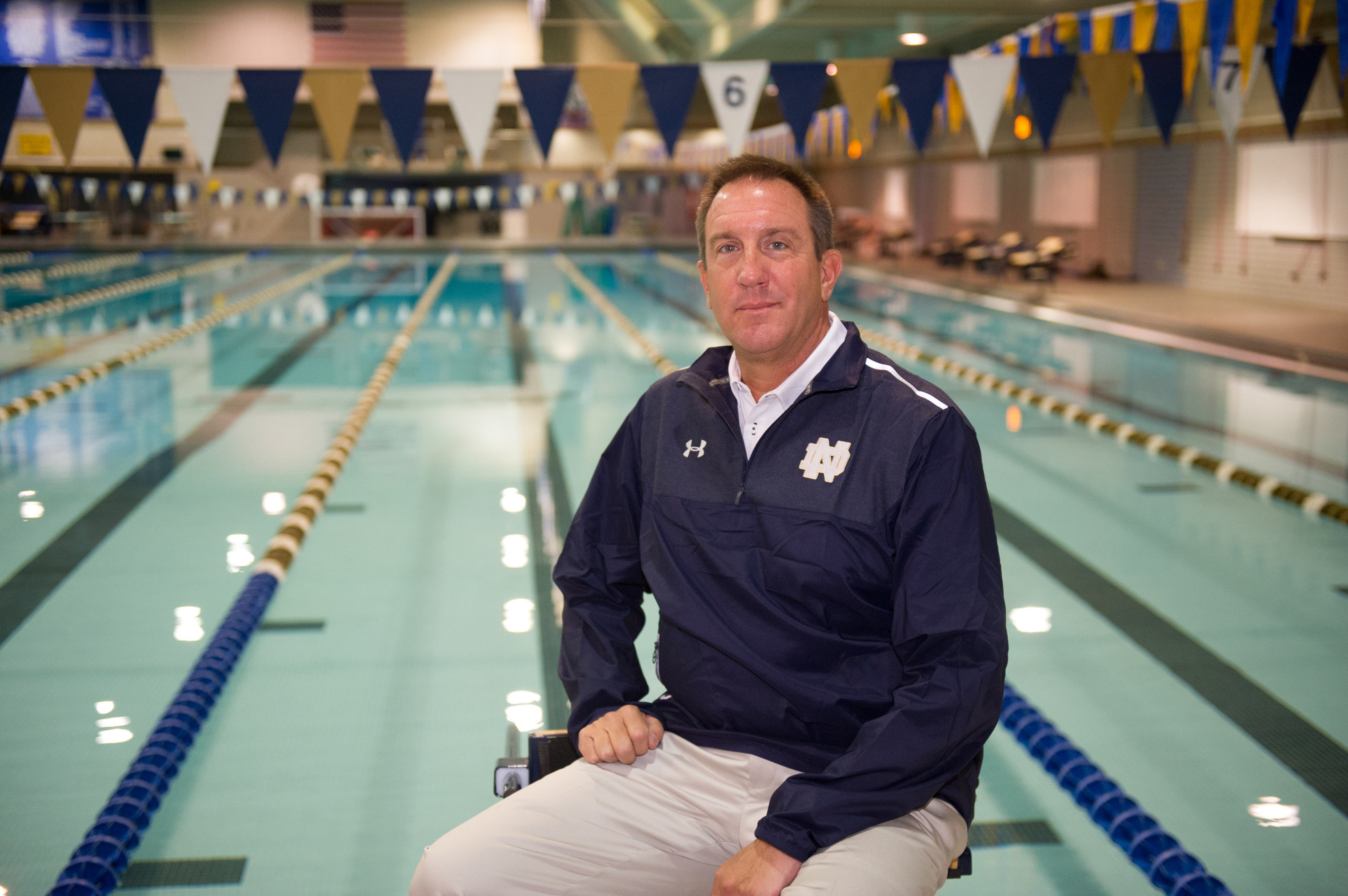 Setting A New Pace In The Pool Mike Litzinger named head coach of both men's and women's swim programs.
