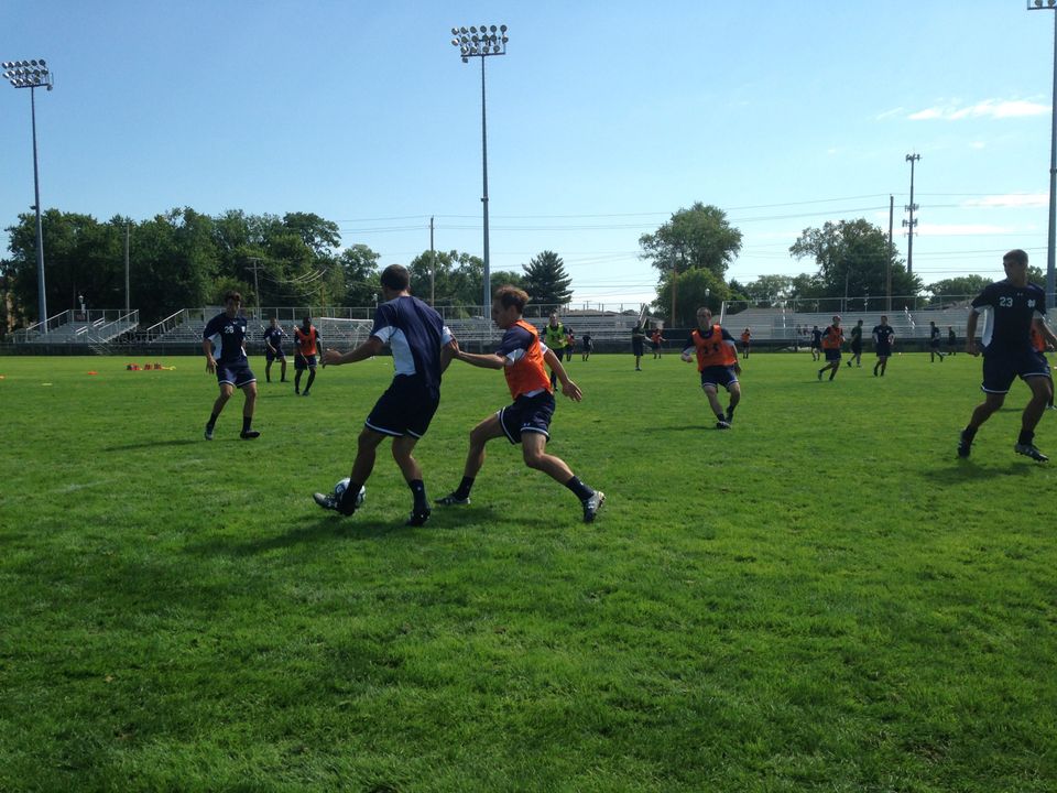 Senior left back Max Lachowecki (right) defending during Wednesday's first practice.