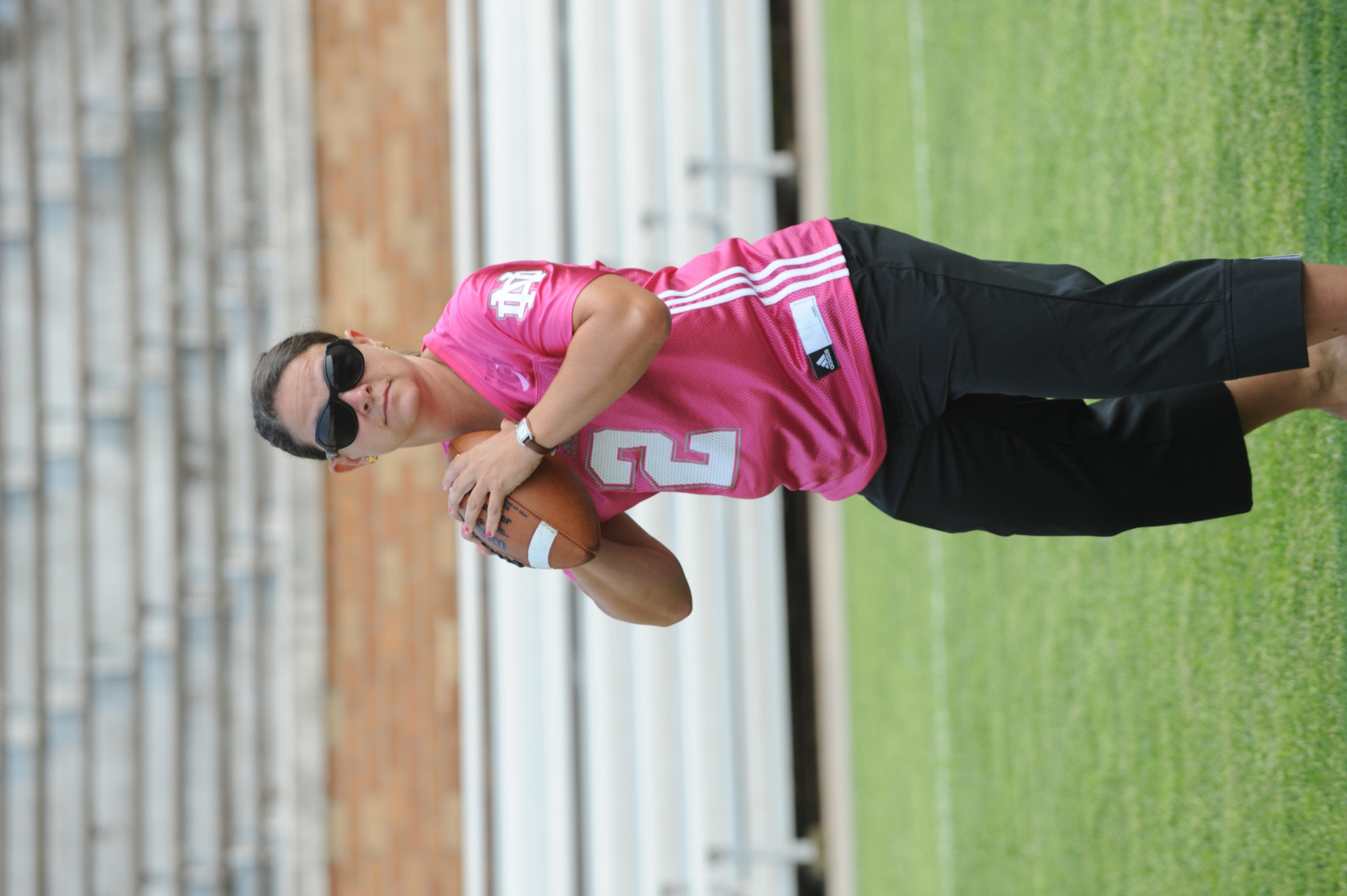 More Than a Cheerleader on the Sidelines Paqui met Brian Kelly while he was an assistant coach at Grand Valley State.