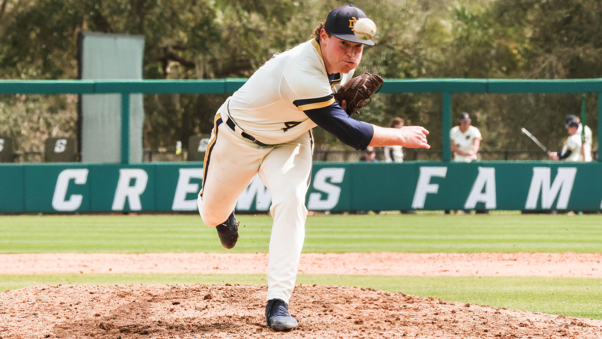 Irish Battery the Difference in Win Over Bruins Jackson Dennies throws a pitch.