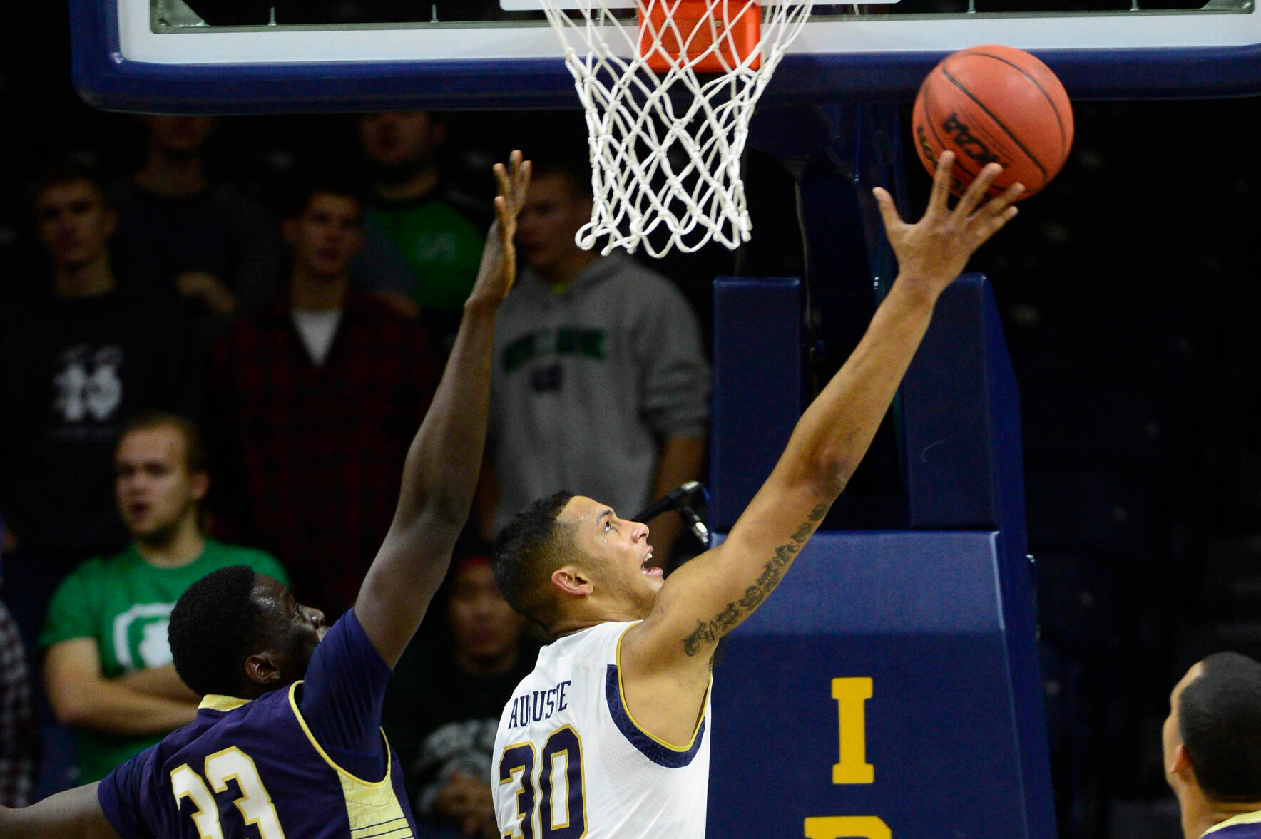Notre Dame Improves To 2-0 With 92-53 Victory Over Navy Zach Auguste shoots the ball during the first half.