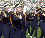 The Notre Dame marching band enters Notre Dame Stadium.