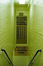 Play Like A Champion Today The Notre Dame football team travels down the steps and under the Play Like A Champion sign before moving into the tunnel and on to the field at Notre Dame Stadium.