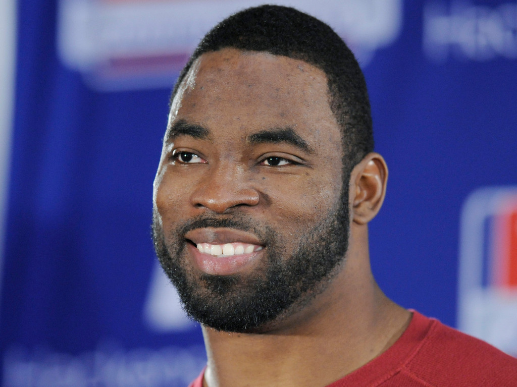 Justin Tuck & Sergio Brown at Super Bowl XLVI (AP)