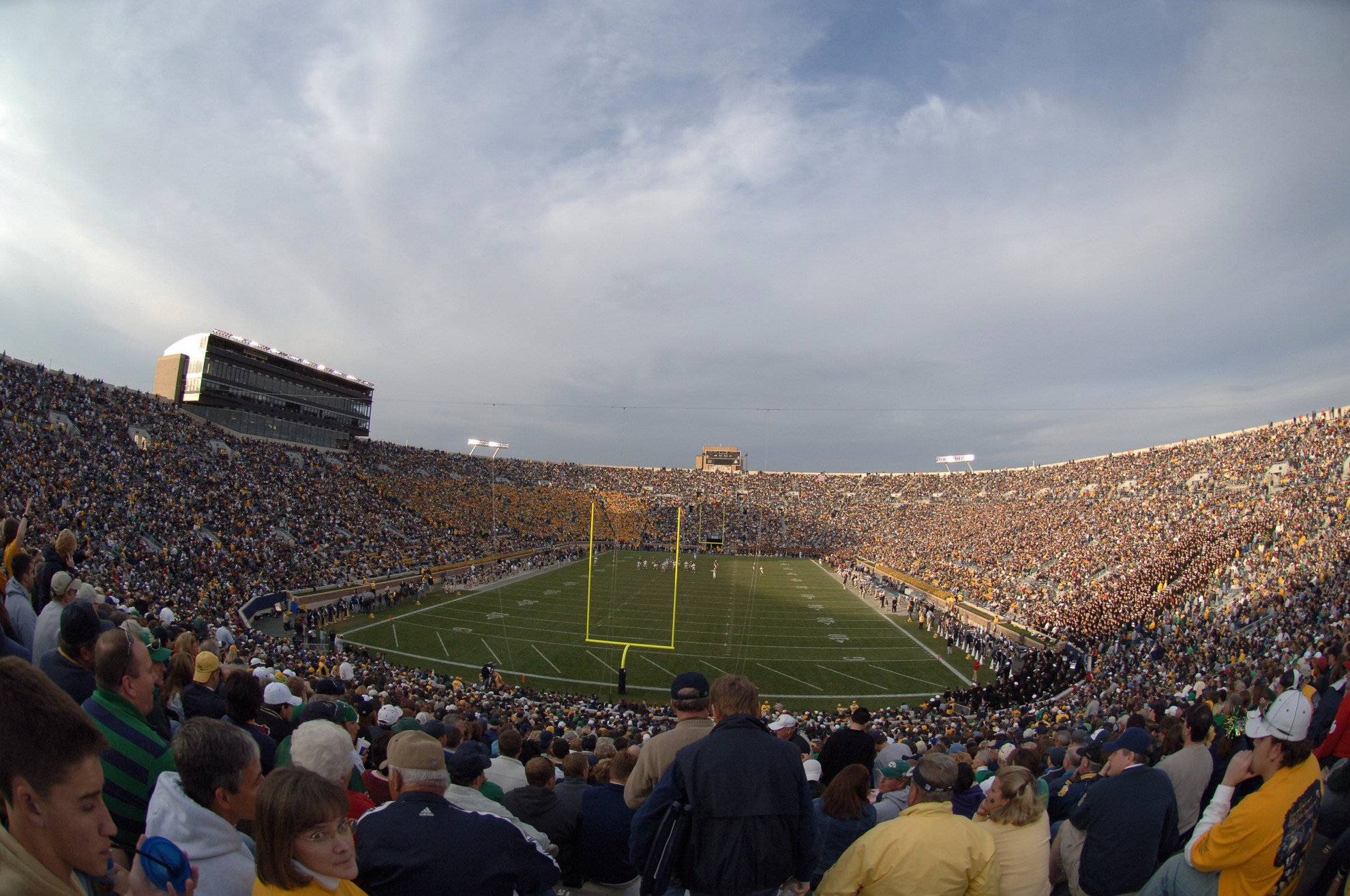 Notre Dame Sports Properties: How Notre Dame Built a Corporate Partner Program for Athletics It does not take long to look around Notre Dame Stadium and notice the lack of signage and logos (plus no video boards showing commercials or otherwise supported by advertisers). It's not hard to see that the business end of Notre Dame athletics is different, if not unique.