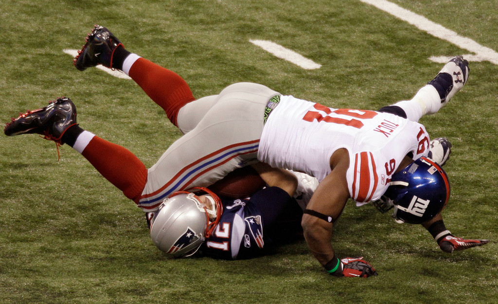Justin Tuck & Sergio Brown at Super Bowl XLVI (AP)