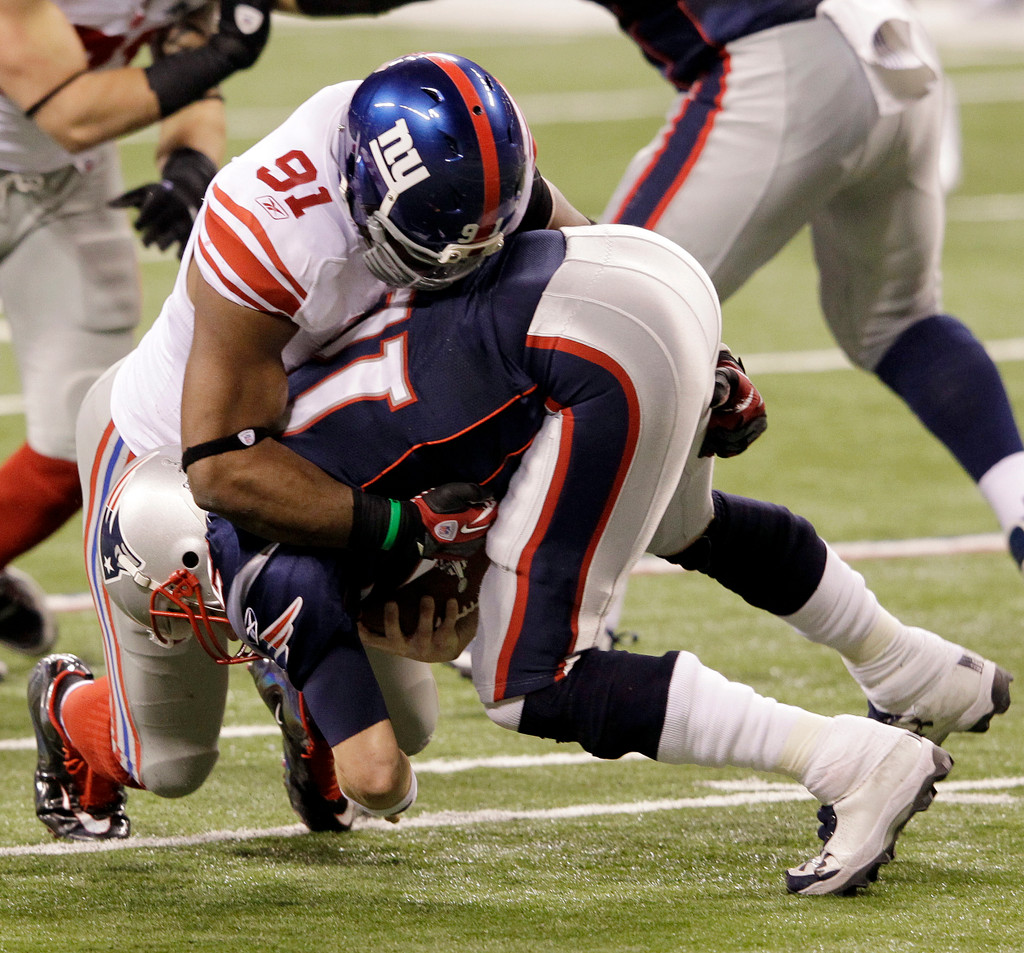 Justin Tuck & Sergio Brown at Super Bowl XLVI (AP)