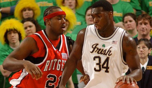 Notre Dame forward Torin Francis drives the lane while Rutgers center Byron Joynes defends during the first half. (AP Photo/Joe Raymond)