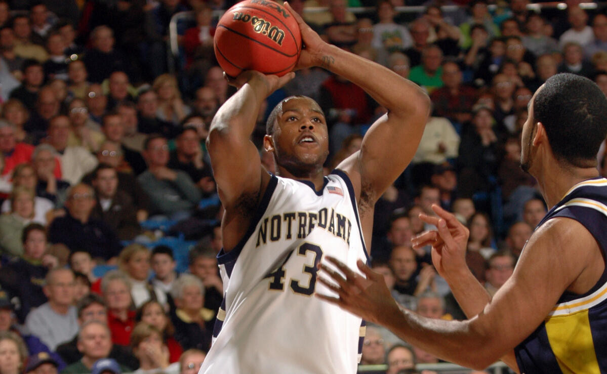 Irish Sneak Past Mountaineers 61-58 Russell Carter puts up a shot during first half.