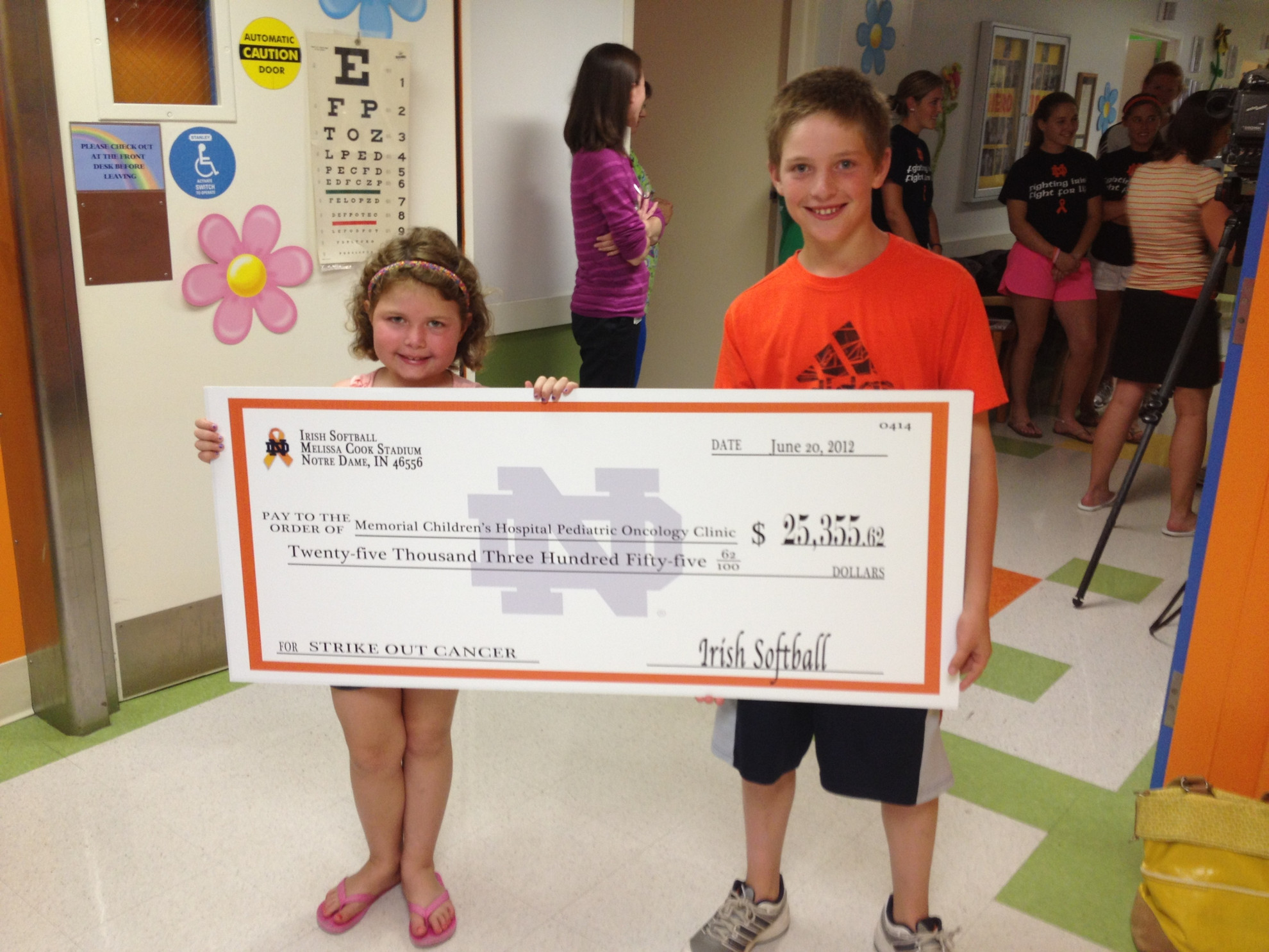 Softball Program Presents StrikeOut Cancer Check To South Bend Memorial Hospital Tatum Gumpf