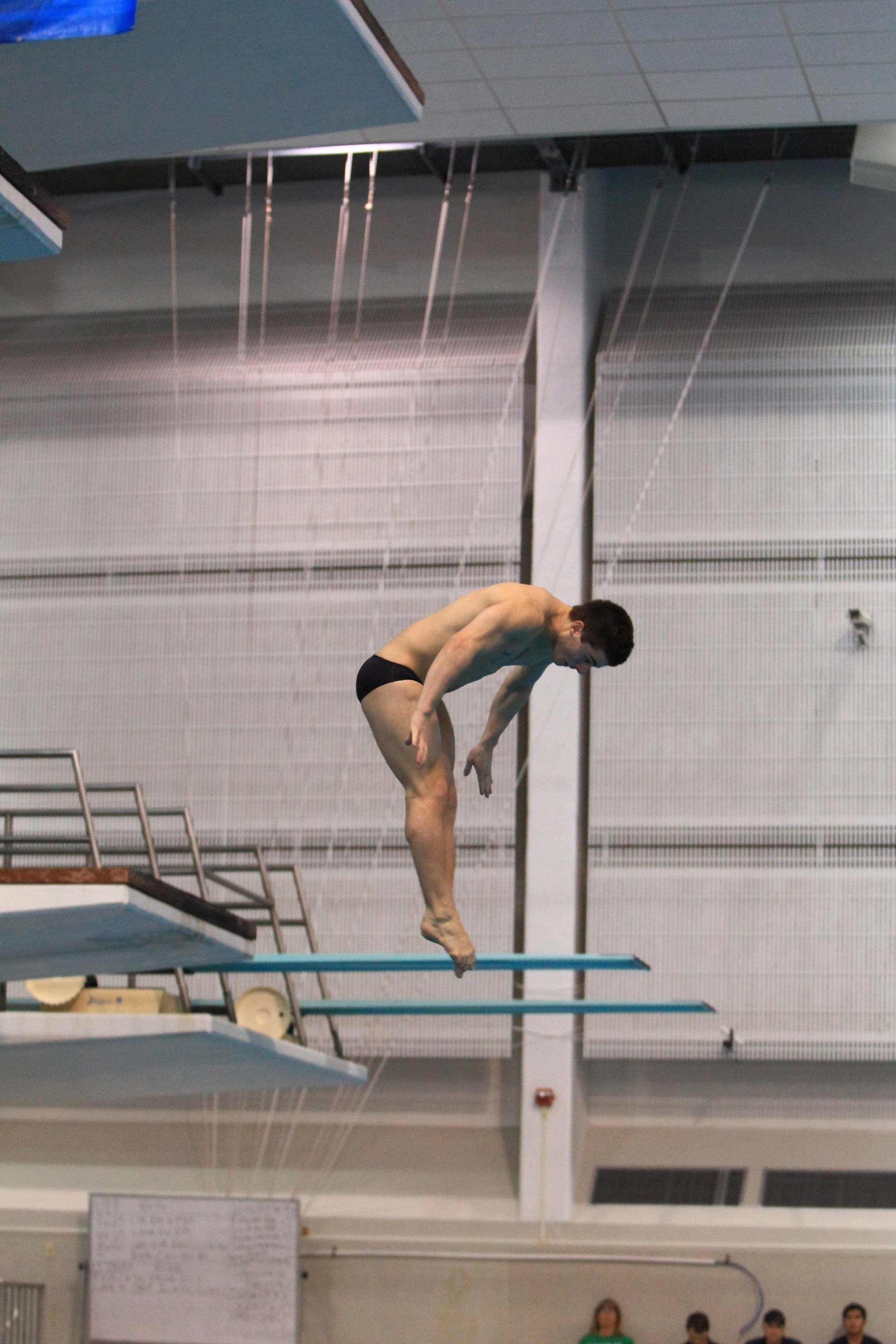 Irish Struggle on First Day of Wisconsin Meet Joe Coumos had the top score for the Irish divers on Friday (353.30), claiming third in the 1-meter