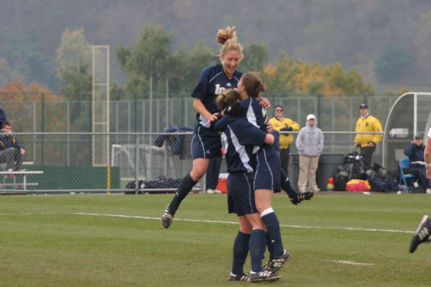 Irish And Mountaineers Play To 1-1 Tie In BIG EAST Final; WVU Wins Shootout For Title Amanda Cinalli (jumping), Brittany Bock (left) and Kerri Hanks (right) each are among the final-15 candidates for the MAC Hermann Trophy.