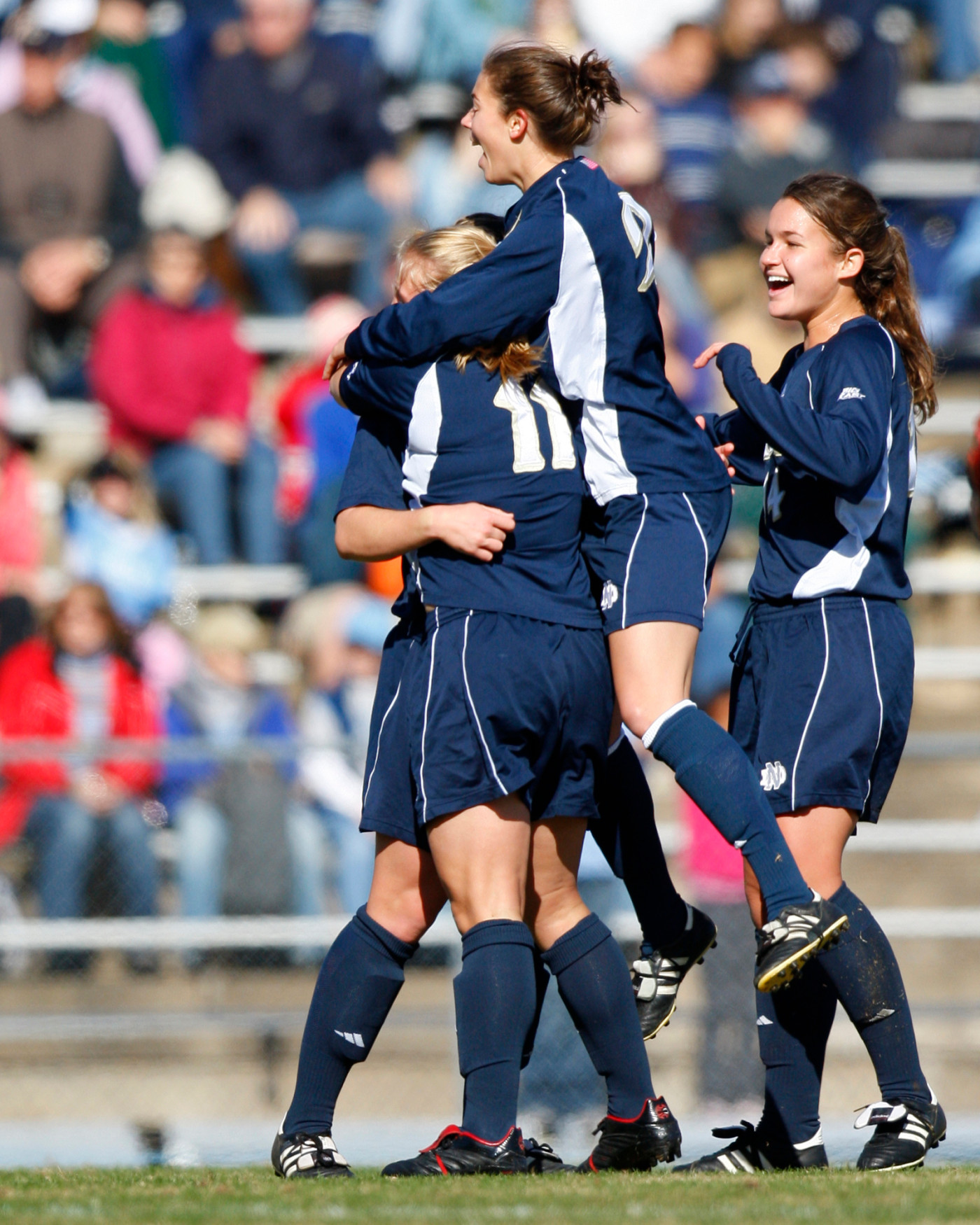 #5/4 Irish Set For Showdown With #3/2 North Carolina Forward Michele Weissenhofer (#11) is swarmed by her teammates after her first-half goal (the second in a 14-second span) in last year's 3-2 win at North Carolina in an NCAA Championship third-round game.