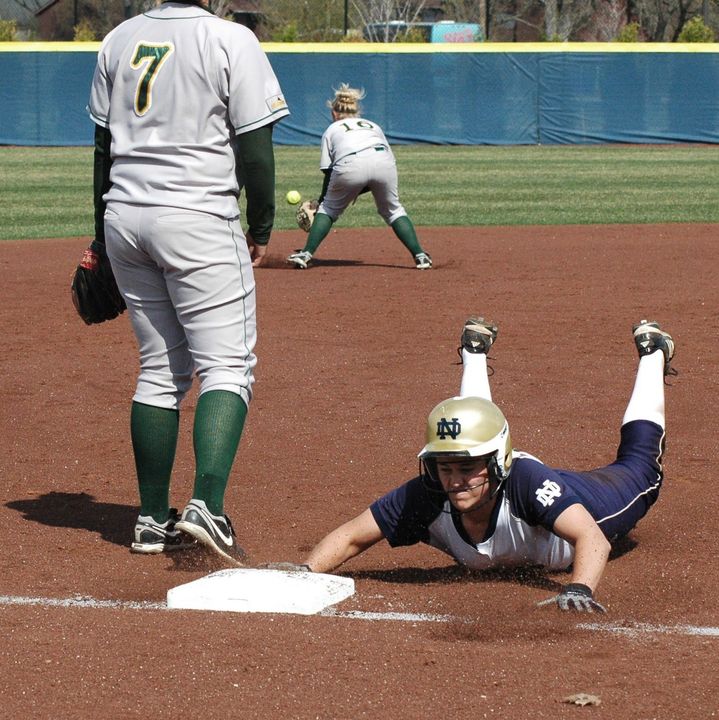 Beth Northway slides into third. She finished the day with four hits in four at-bats.