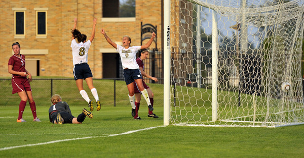 Henderson’s Goal Lifts #4 Irish Past Minnesota, 1-0 On Opening Night Elizabeth Tucker (8) and Lauren Fowlkes (9) celebrate after Melissa Henderson's goal in the second half of Friday night's 1-0 Irish win over Minnesota at Alumni Stadium.