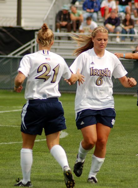 Sophomore forward Melissa Henderson (6) scored twice and junior midfielder Erica Iantorno (21) delivered a pair of assists as third-ranked Notre Dame scored three times in the first 14 minutes before settling for a 3-3 exhibition draw with No. 9 Virginia on Friday in Maple City, Mich.