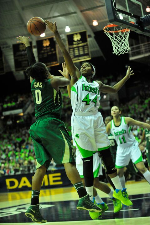 Ariel Braker blocks a shot by Baylor's Odyssey Sims in last season's matchup.