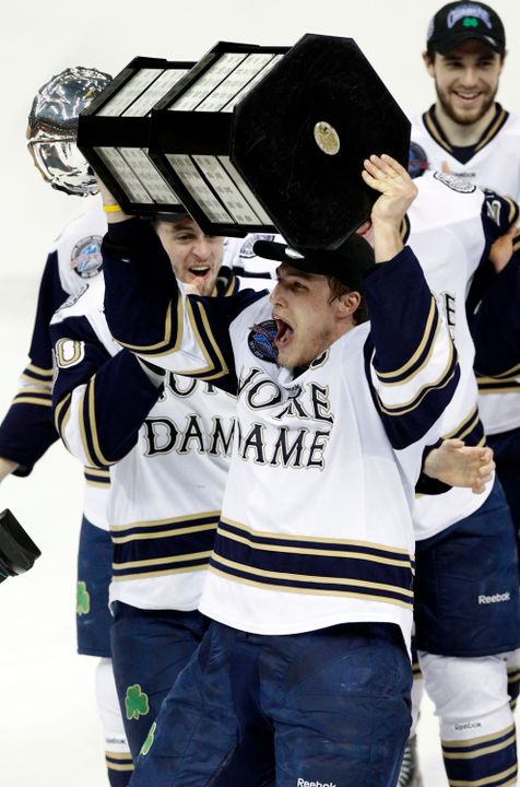 Notre Dame captain Anders Lee with the final CCHA Mason Cup trophy on March 24th.  On Monday, July 1, the Irish become members of Hockey East