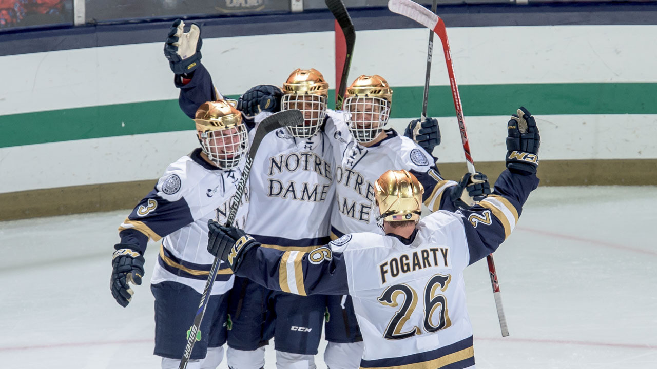 Irish Battle Back Twice; Tie No. 5 Minnesota-Duluth, 3-3 The Irish celebrate Justin Wade's shorthanded goal in the second period.