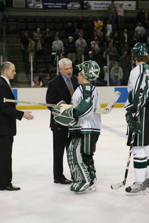 Notre Dame head coach Jeff Jackson and Michigan State goaltender Jeff Lerg in the post-game handshake line following the Irish 3-1 win over the Spartans.