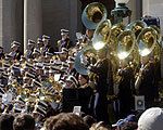The Notre Dame marching band performs on the steps of Bond Hall.