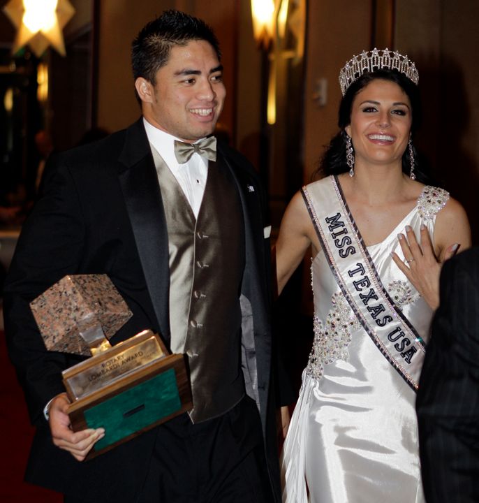 Manti Te'o with the Lombardi Award trophy and Miss Texas Ali Nugent