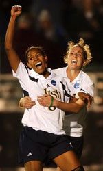 Candace Chapman (8), left, celebrates her goal with Jen Buczkowski (9) in the second half against Santa Clara, in the national semifinals of the Division I Women's Soccer Championship College Cup at SAS Stadium on Friday, Dec. 3, 2004 in Cary, N.C.(AP photo/Sara D. Davis)