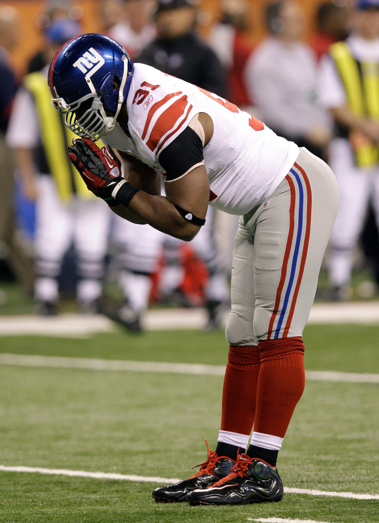 Justin Tuck & Sergio Brown at Super Bowl XLVI (AP)
