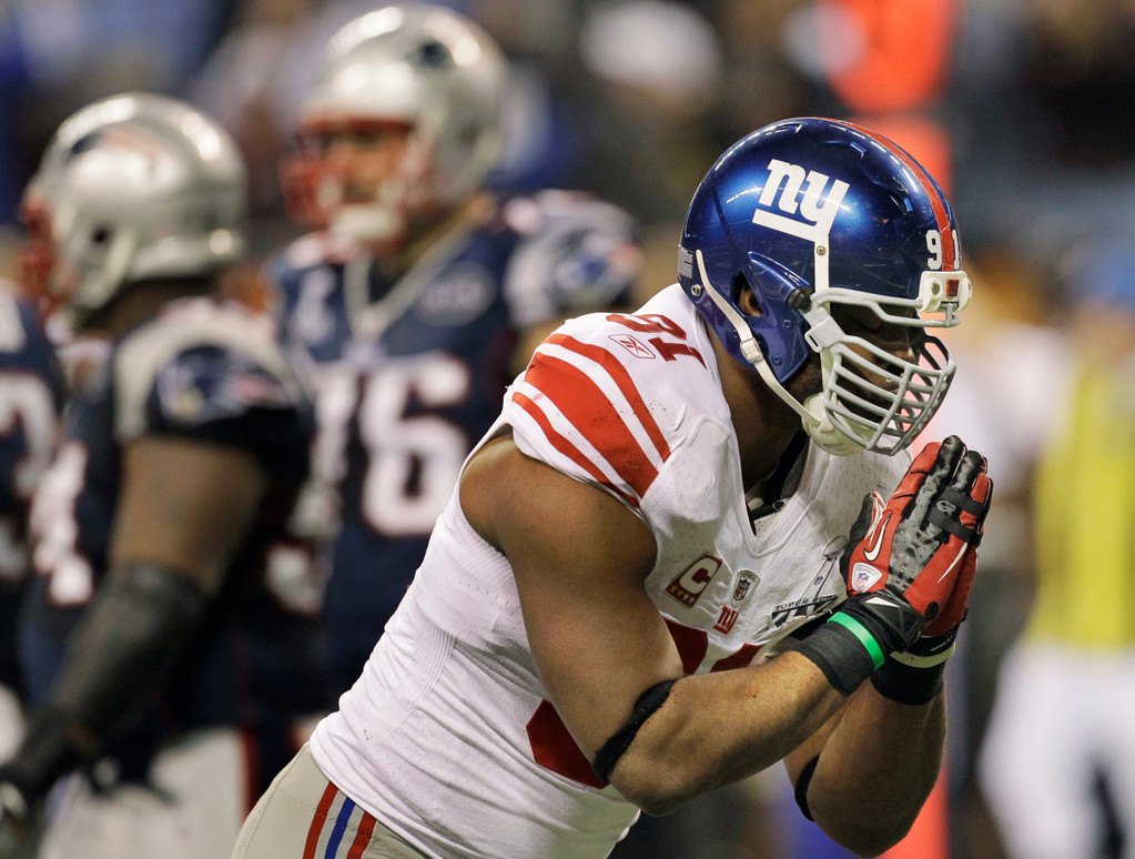 Justin Tuck & Sergio Brown at Super Bowl XLVI (AP)