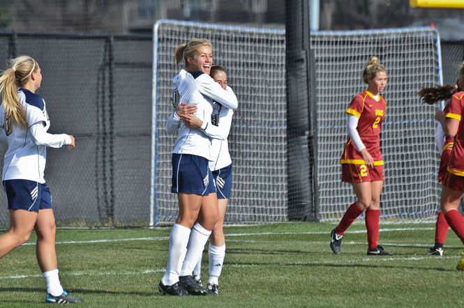 Senior co-captain Lauren Fowlkes (left) celebrates with freshman Elizabeth Tucker after Fowlkes' first-half goal in Notre Dame's 4-0 win over #22 USC in the second round of the NCAA Championship on Sunday afternoon at Alumni Stadium.