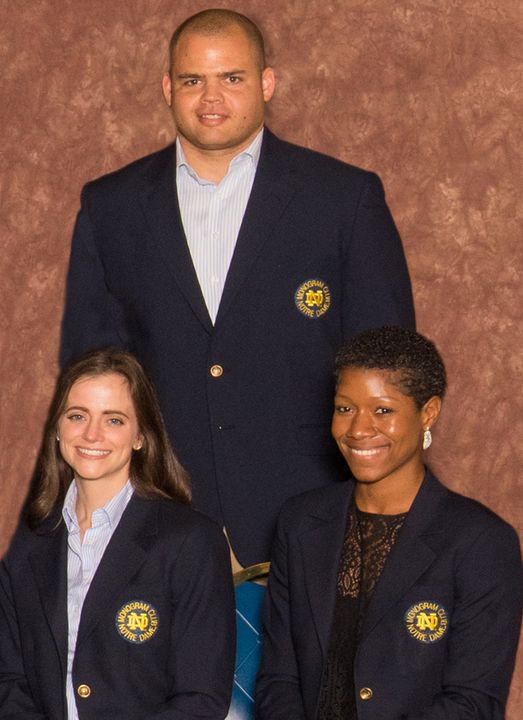 Jeff Faine (standing), Jennette Rauch (left) and Jes Christian (right) will serve a four-year term on the Monogram Club Board of Directors.