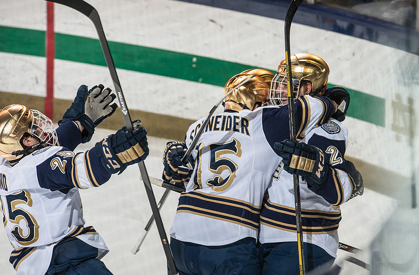 Irish Winning Streak Goes To Four Straight With 4-2 Win Over Lake Superior State Peter Schneider (left) and Steven Fogarty (right) celebrate an Irish goal against Lake Superior State.