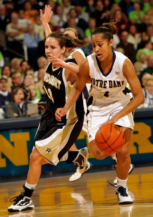 Notre Dame guard Skylar Diggins, right, drives the lane as Vanderbilt guard Meredith Marsh defends during the first half of an NCAA college basketball game on Thursday Dec. 31, 2009, in South Bend, Ind. (AP Photo/Joe Raymond)