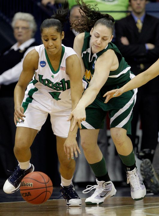 Skylar Diggins steals the ball from Vermont's Tonya Young in the first half. (AP Photo/Michael Conroy)