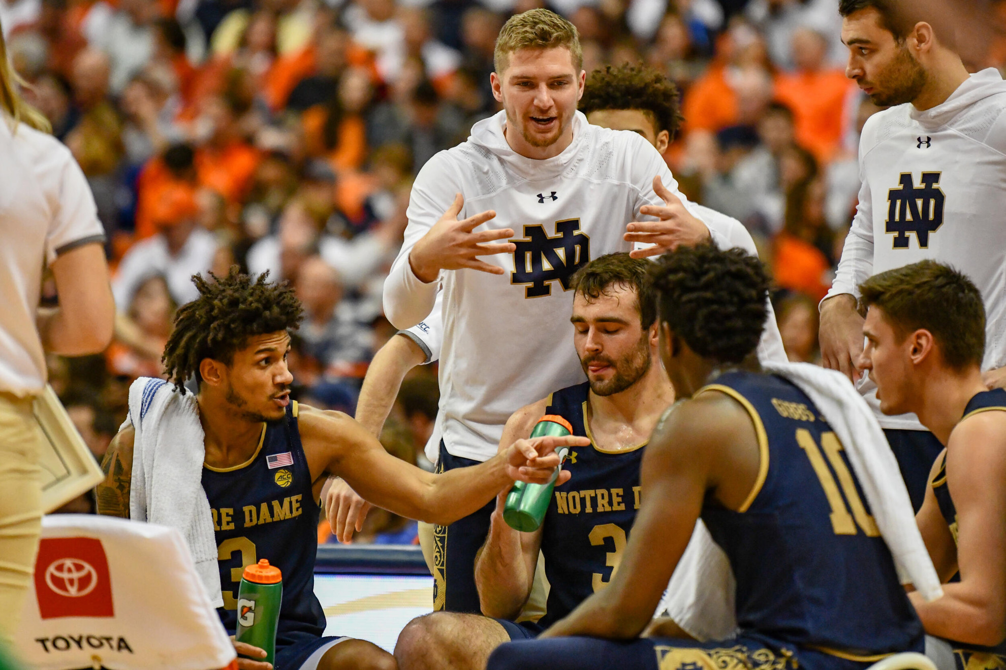 Road Swing Continues At NC State Team Huddle at Syracuse